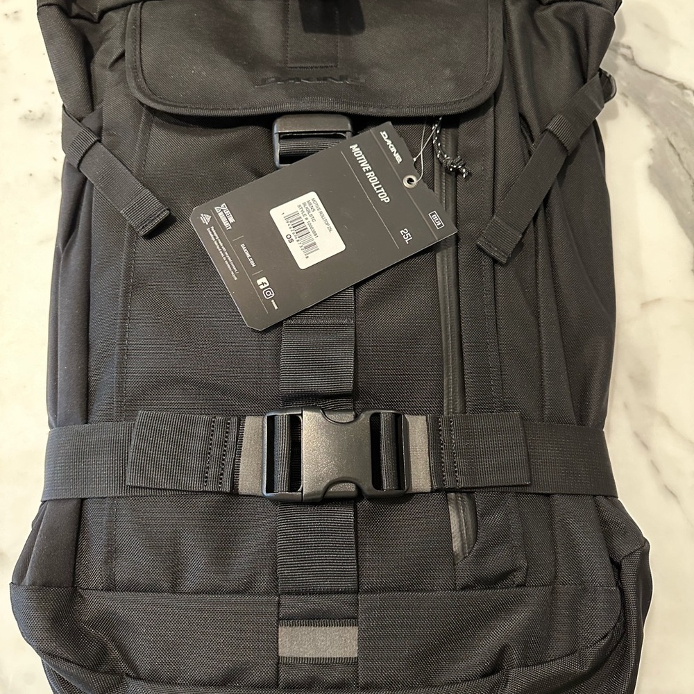Dakine Motive Rolltop backpack with tags